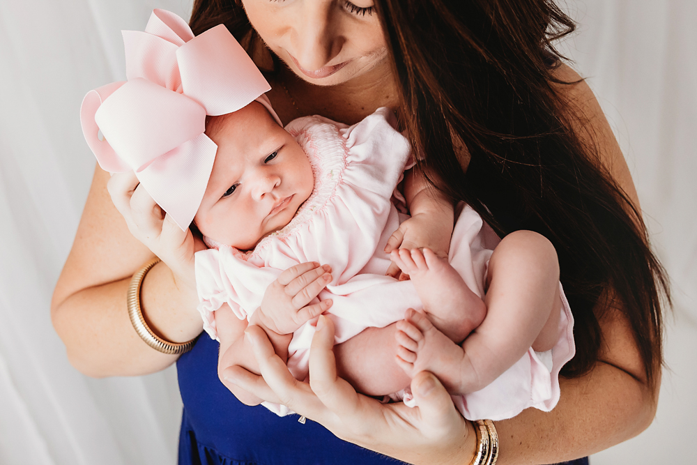 Baby Logan mommy kiss at Reflection Images by Tracy Rowell in Florence SC