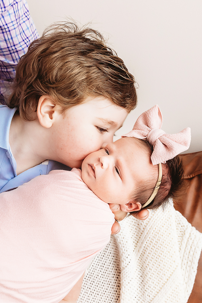 Baby Kolby siblings on couch at Reflection Images by Tracy Rowell in Florence SC