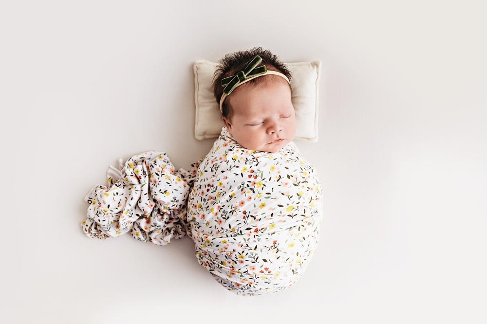 Baby Logan laying on back at Reflection Images by Tracy Rowell in Florence SC