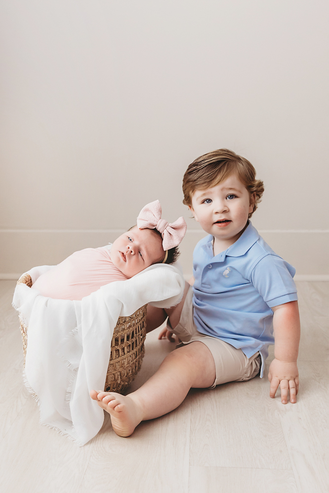 Baby Logan wrapped in pink at Reflection Images by Tracy Rowell in Florence SC