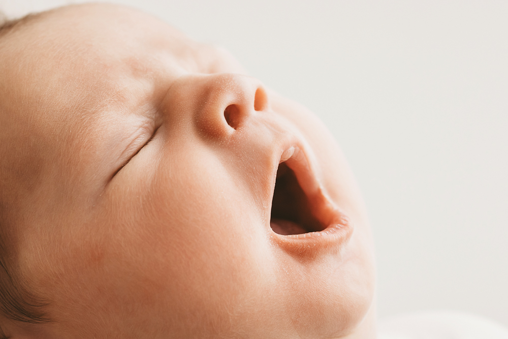 Baby Logan yawn moment at Reflection Images by Tracy Rowell in Florence SC