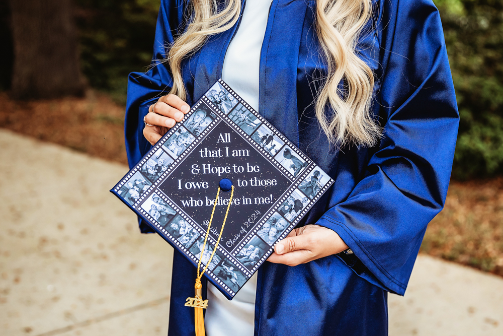 Detailed view of Kristina's graduation cap with a heartfelt quote and photo collage, captured outdoors at Reflection Images by Tracy Rowell in Florence SC