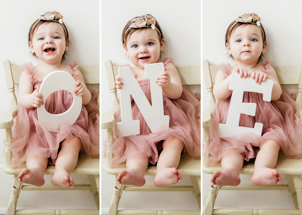 Three portraits of Aubrey in a pink tulle dress holding letters O, N, and E on a cream wooden chair at Reflection Images by Tracy Rowell in Florence SC
