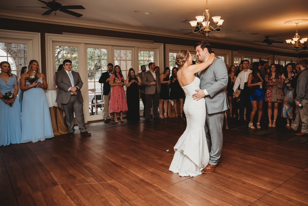 Romantic first dance moment of bride and groom on the dance floor at Reflection Images by Tracy Rowell in Florence SC