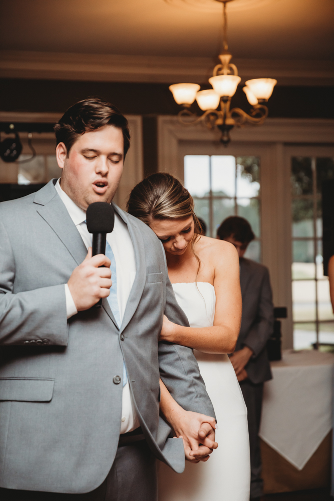Romantic first dance moment of bride and groom on the dance floor at Reflection Images by Tracy Rowell in Florence SC
