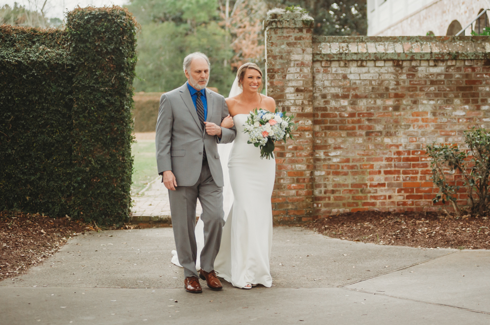 Wedding ceremony with vows and emotional moments on scenic Daniel Island at Reflection Images by Tracy Rowell in Florence SC
