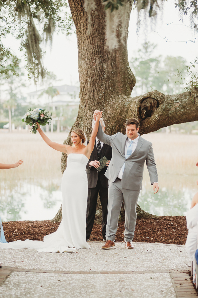 Wedding ceremony with vows and emotional moments on scenic Daniel Island at Reflection Images by Tracy Rowell in Florence SC