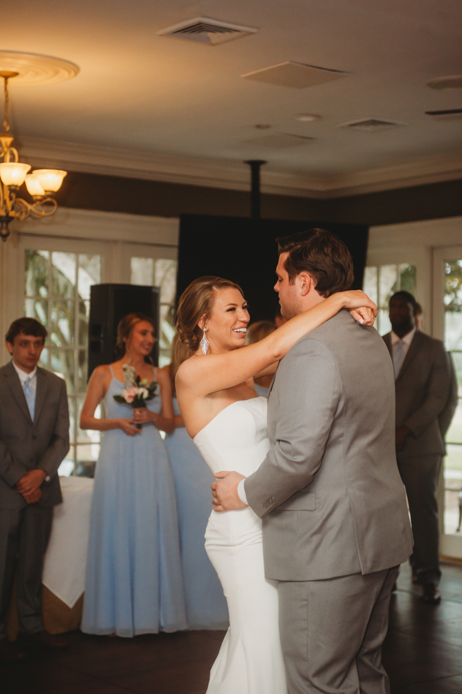 Romantic first dance moment of bride and groom on the dance floor at Reflection Images by Tracy Rowell in Florence SC