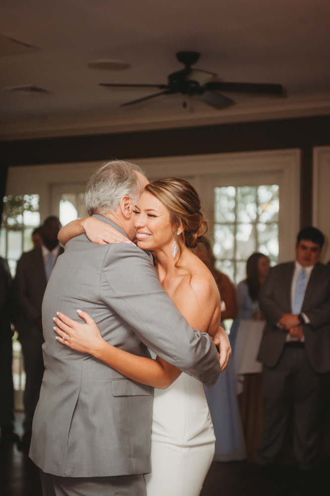 Wedding reception dancing, laughter, and celebration at Reflection Images by Tracy Rowell in Florence SC
