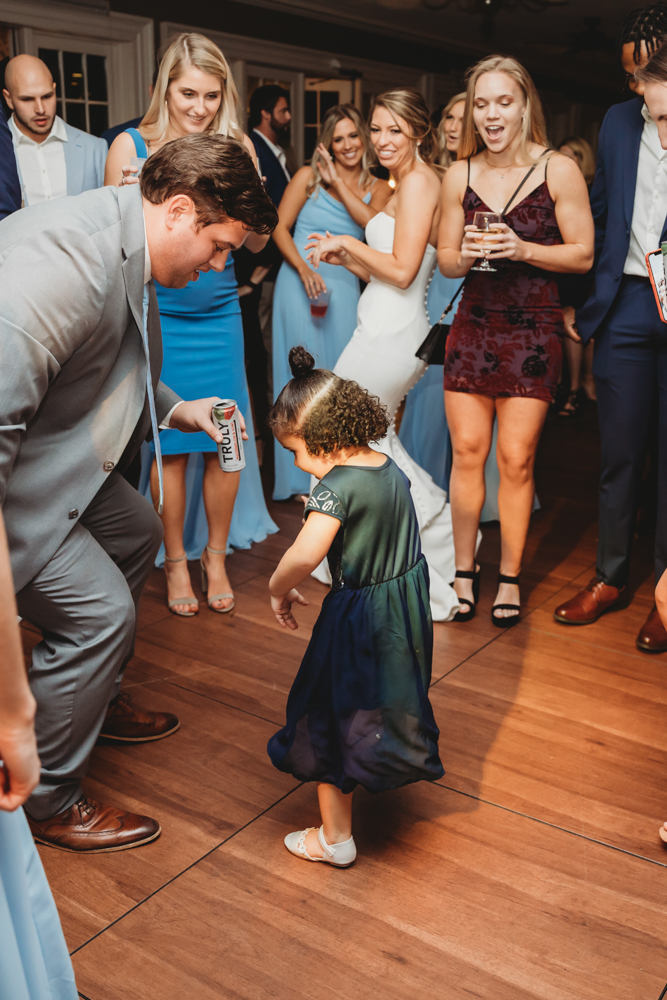 Wedding reception dancing, laughter, and celebration at Reflection Images by Tracy Rowell in Florence SC