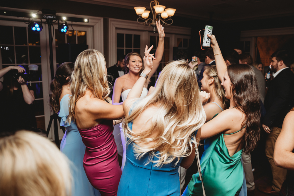 Wedding reception dancing, laughter, and celebration at Reflection Images by Tracy Rowell in Florence SC
