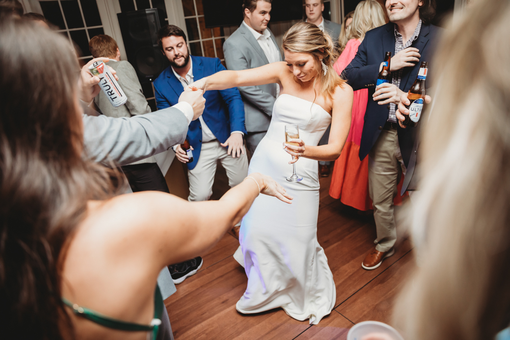 Wedding reception dancing, laughter, and celebration at Reflection Images by Tracy Rowell in Florence SC