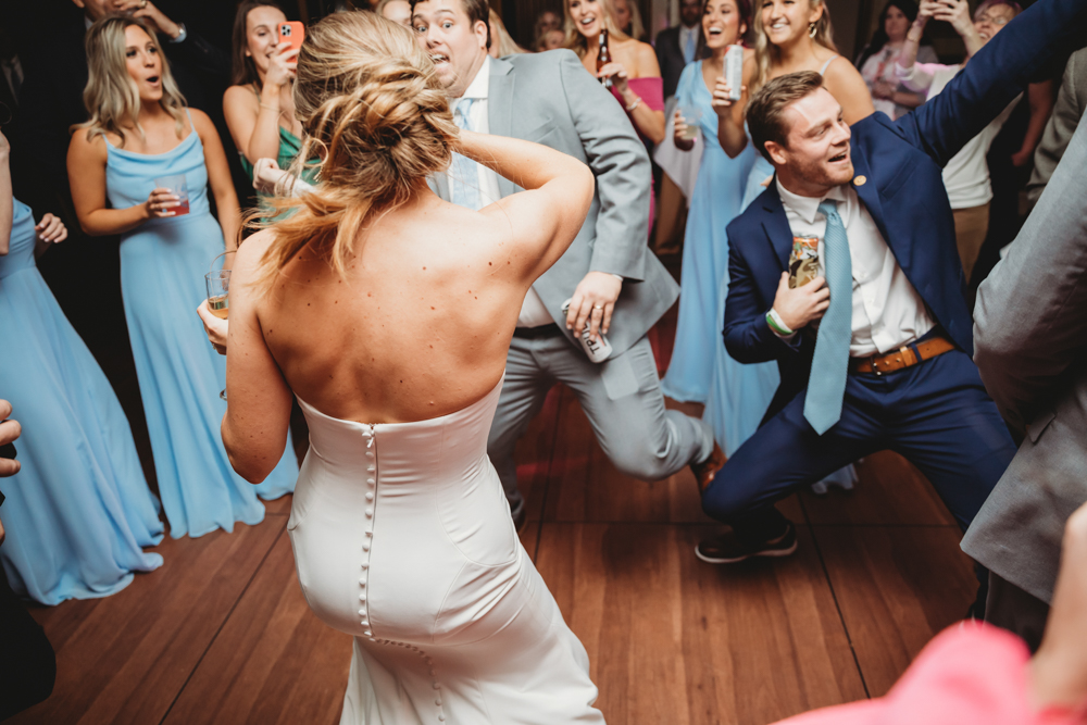 Wedding reception dancing, laughter, and celebration at Reflection Images by Tracy Rowell in Florence SC