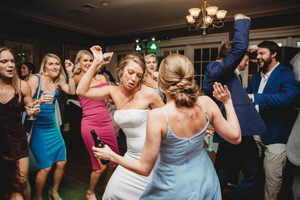 Wedding reception dancing, laughter, and celebration at Reflection Images by Tracy Rowell in Florence SC