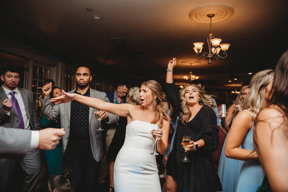 Wedding reception dancing, laughter, and celebration at Reflection Images by Tracy Rowell in Florence SC