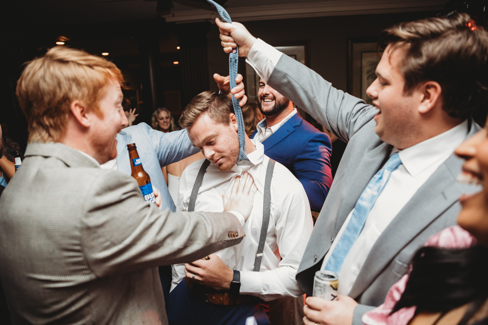 Wedding reception dancing, laughter, and celebration at Reflection Images by Tracy Rowell in Florence SC