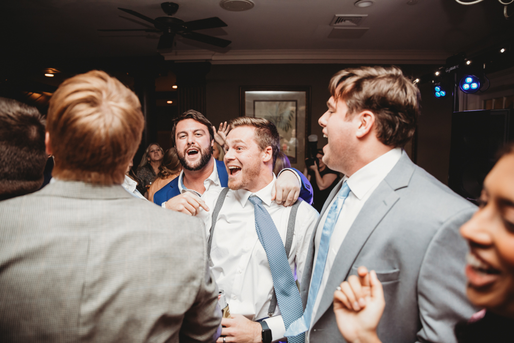 Wedding reception dancing, laughter, and celebration at Reflection Images by Tracy Rowell in Florence SC