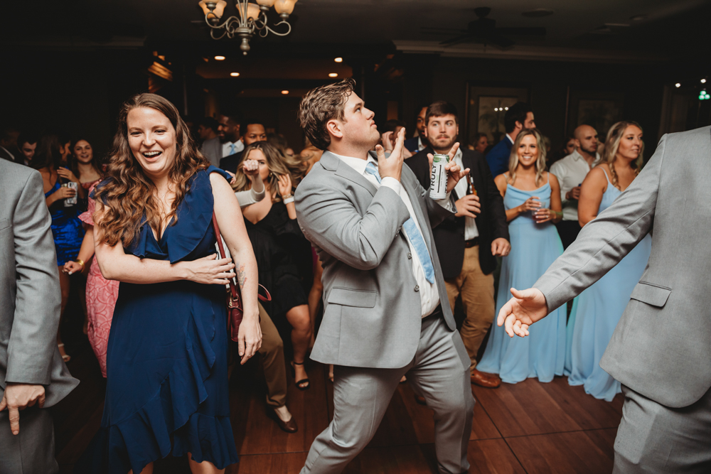 Wedding reception dancing, laughter, and celebration at Reflection Images by Tracy Rowell in Florence SC