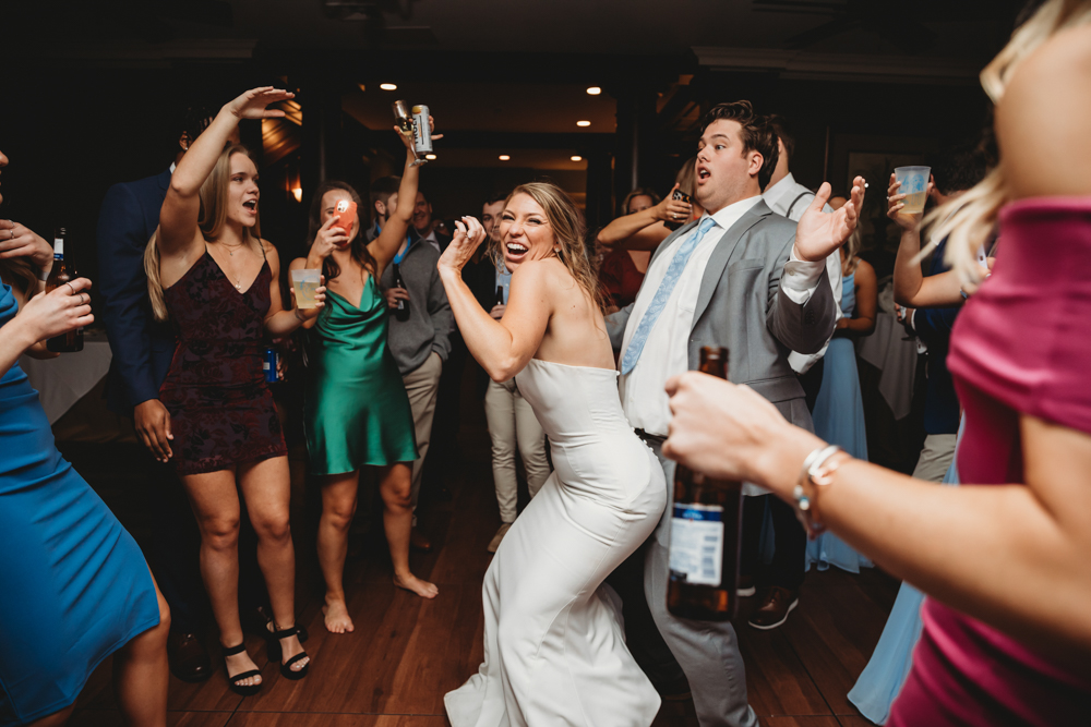 Wedding reception dancing, laughter, and celebration at Reflection Images by Tracy Rowell in Florence SC