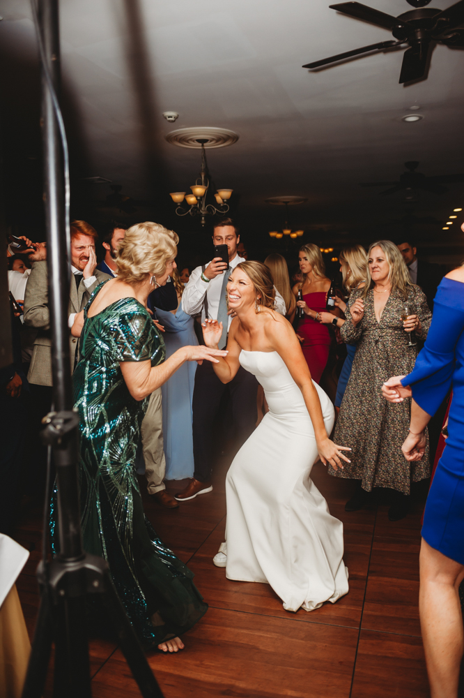 Wedding reception dancing, laughter, and celebration at Reflection Images by Tracy Rowell in Florence SC