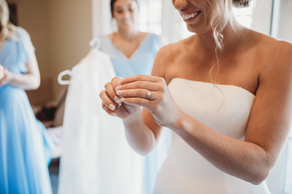 Bridal party group photo with fashionable gowns and suits at Reflection Images by Tracy Rowell in Florence SC