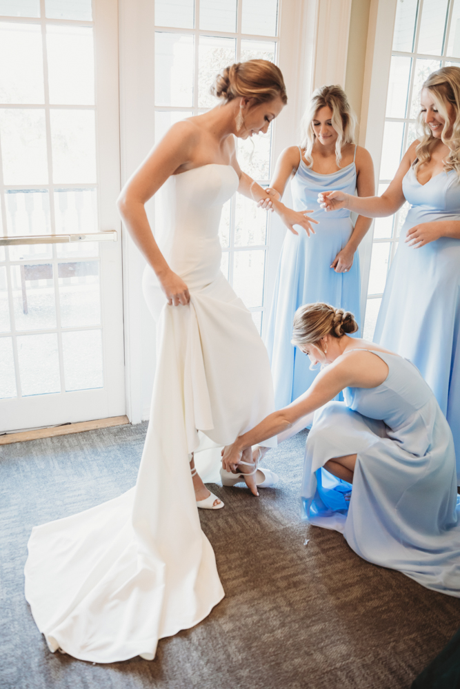 Bridal party group photo with fashionable gowns and suits at Reflection Images by Tracy Rowell in Florence SC