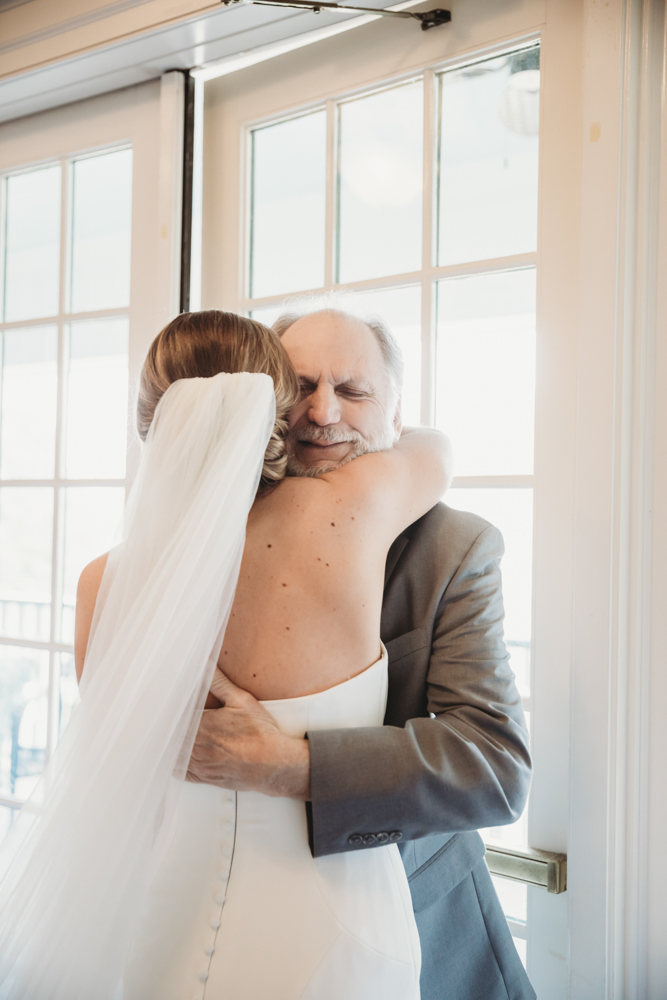Emotional candid moment with tears and heartfelt expressions at Reflection Images by Tracy Rowell in Florence SC