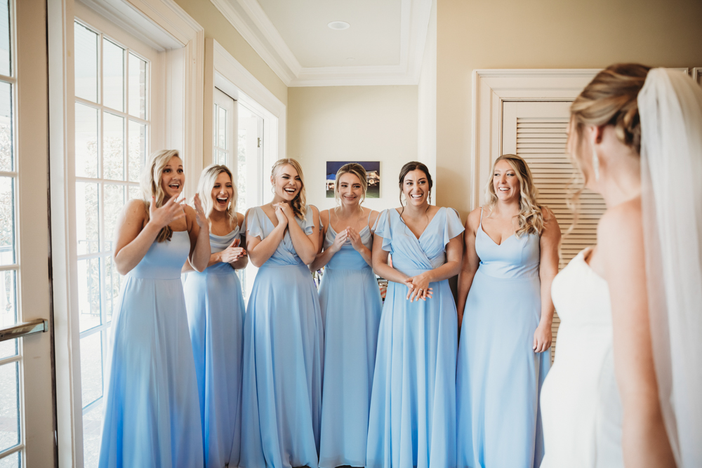 Bridal party group photo with fashionable gowns and suits at Reflection Images by Tracy Rowell in Florence SC