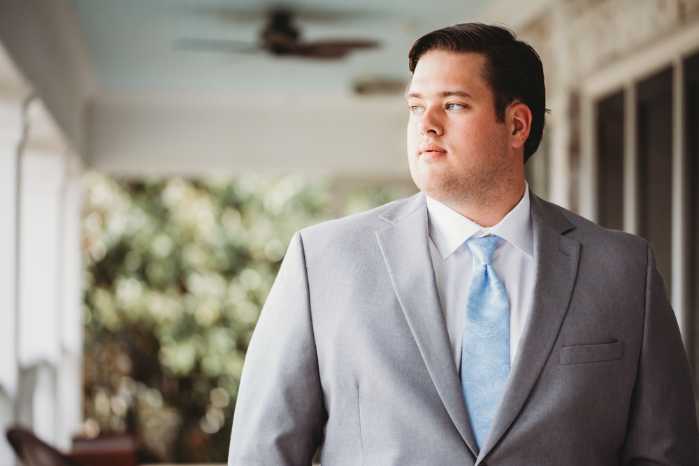 Bride and groom sharing emotional first look before ceremony at Reflection Images by Tracy Rowell in Florence SC
