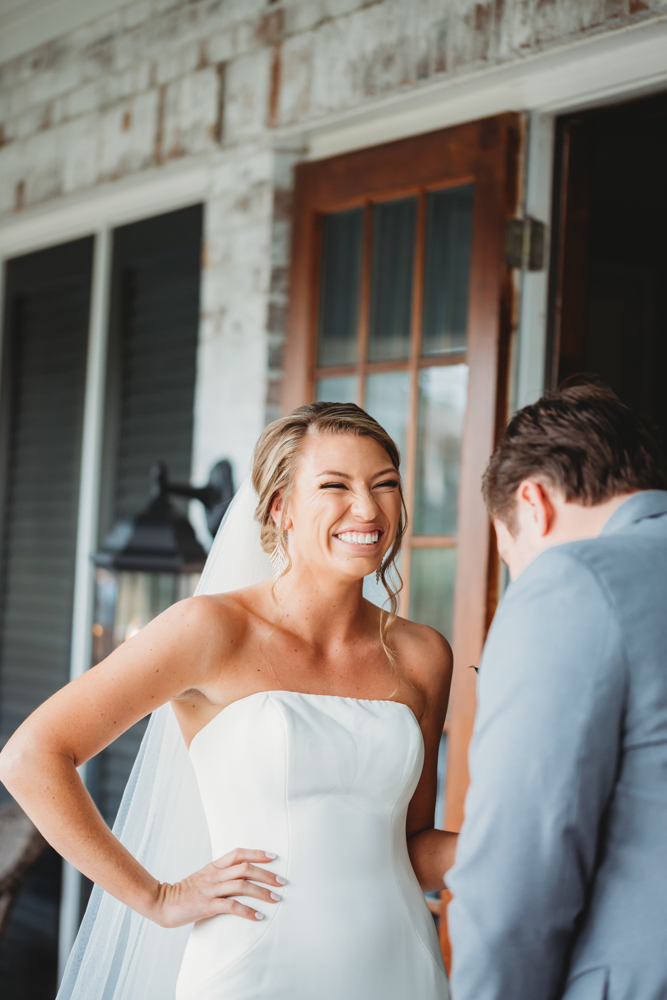 Bride and groom sharing emotional first look before ceremony at Reflection Images by Tracy Rowell in Florence SC