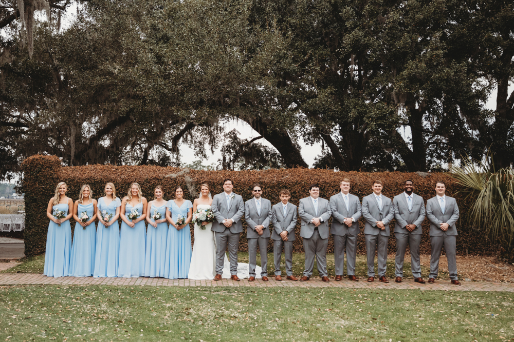 Family group portrait with joyful smiles and classic styling at Reflection Images by Tracy Rowell in Florence SC