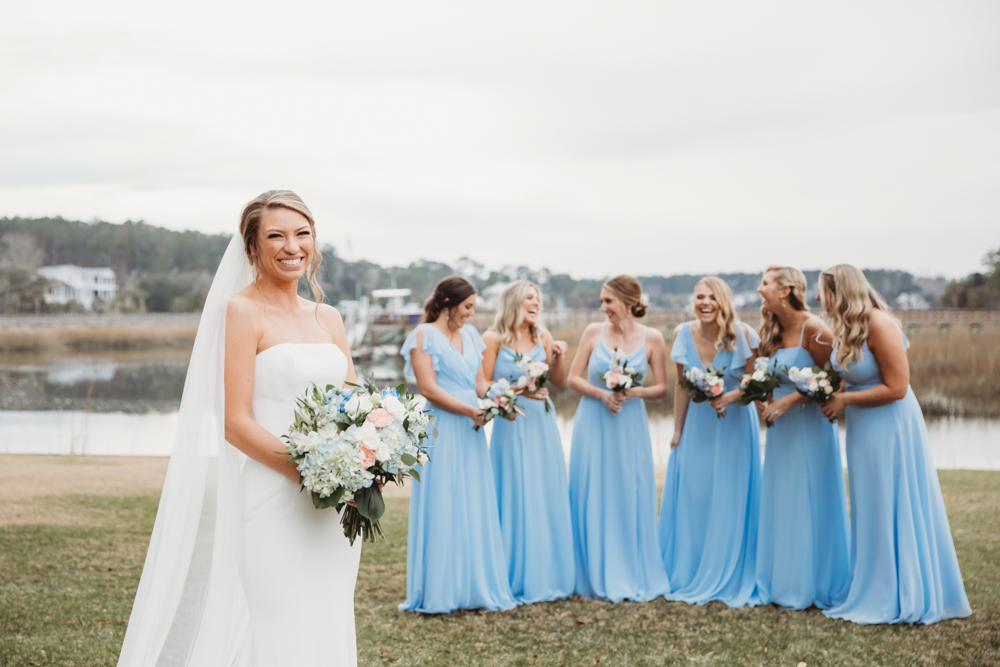 Bridal party group photo with fashionable gowns and suits at Reflection Images by Tracy Rowell in Florence SC