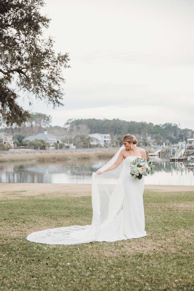 Bridal party group photo with fashionable gowns and suits at Reflection Images by Tracy Rowell in Florence SC