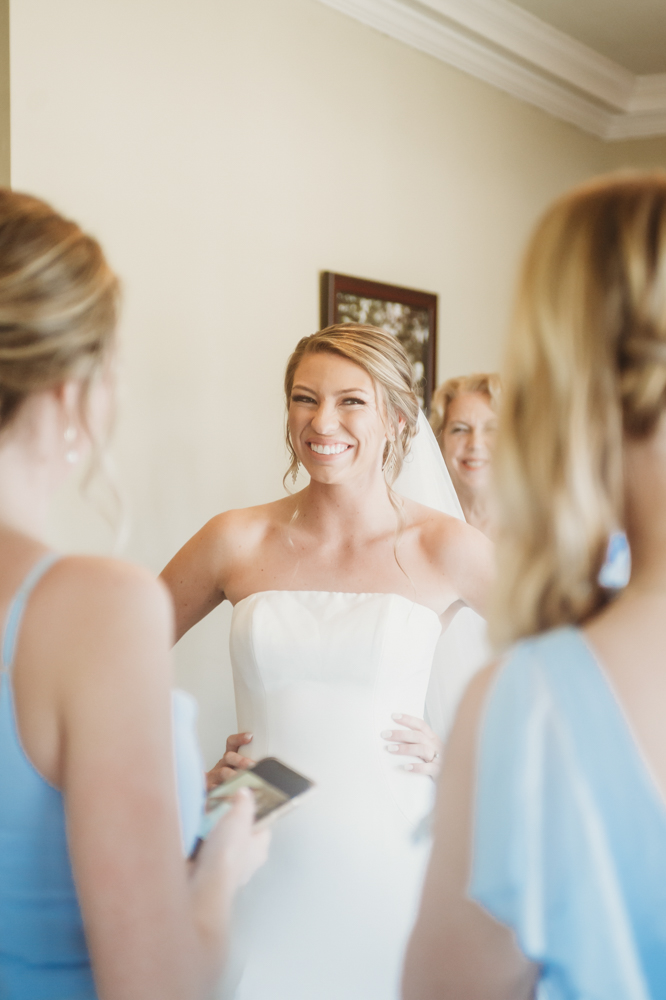Bridal party group photo with fashionable gowns and suits at Reflection Images by Tracy Rowell in Florence SC
