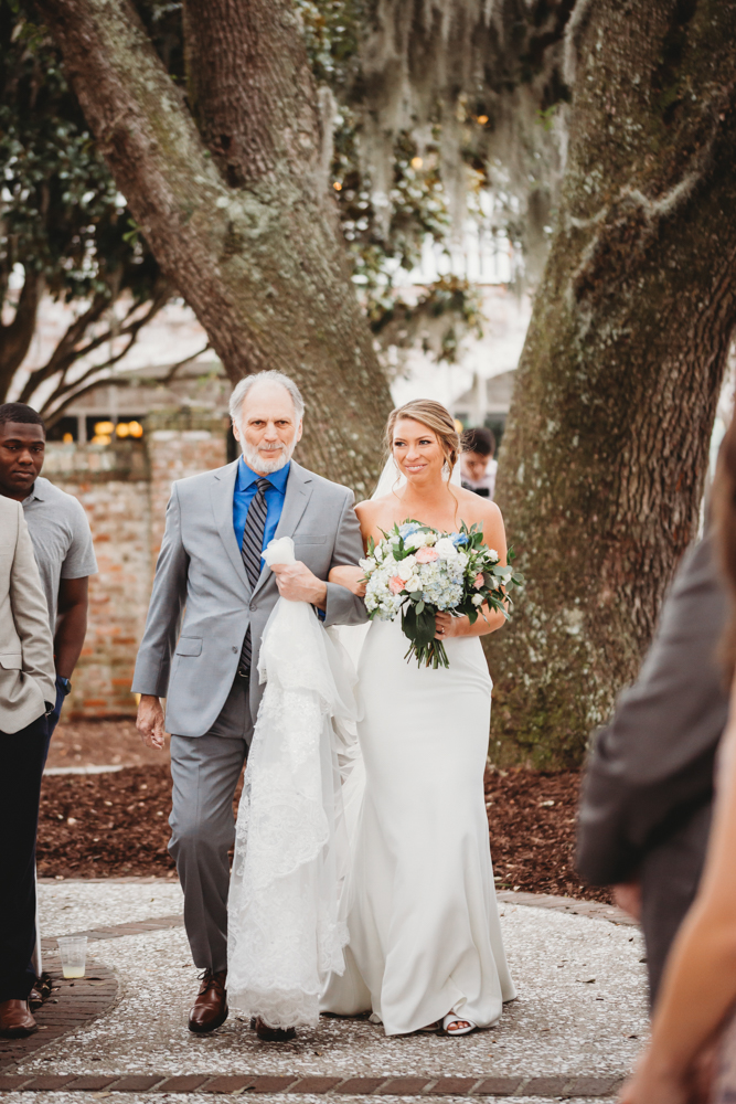 Wedding ceremony with vows and emotional moments on scenic Daniel Island at Reflection Images by Tracy Rowell in Florence SC