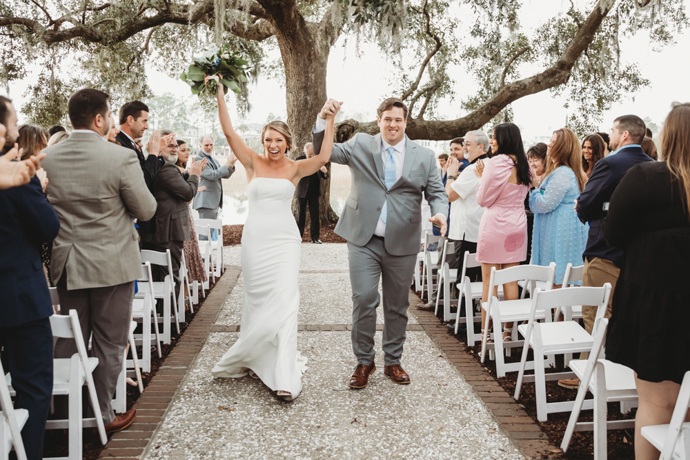 Wedding ceremony with vows and emotional moments on scenic Daniel Island at Reflection Images by Tracy Rowell in Florence SC