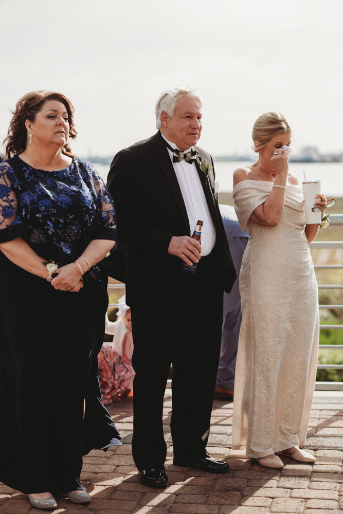 Charleston SC Wedding moment during wedding party celebration, captured by tracy rowell.