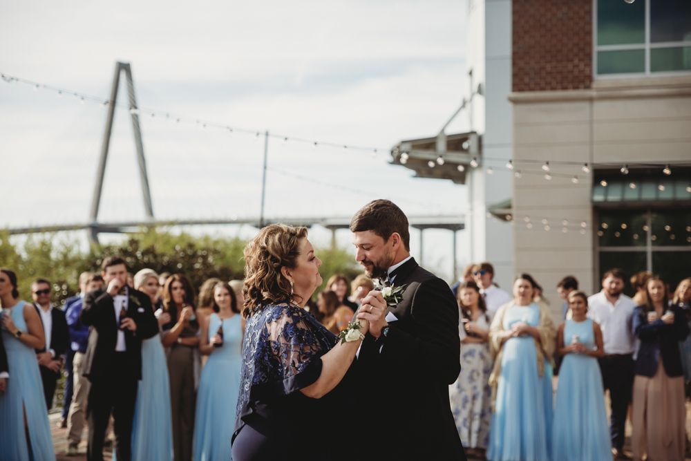 Charleston SC Wedding moment during wedding party celebration, captured by tracy rowell.