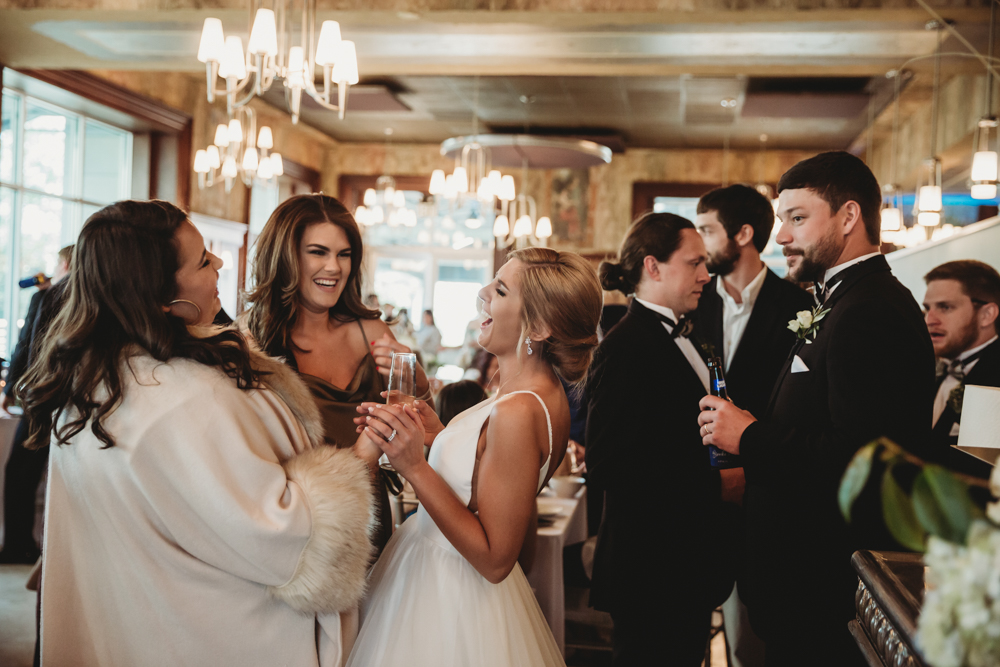 Charleston SC Wedding moment during wedding party celebration, captured by tracy rowell.