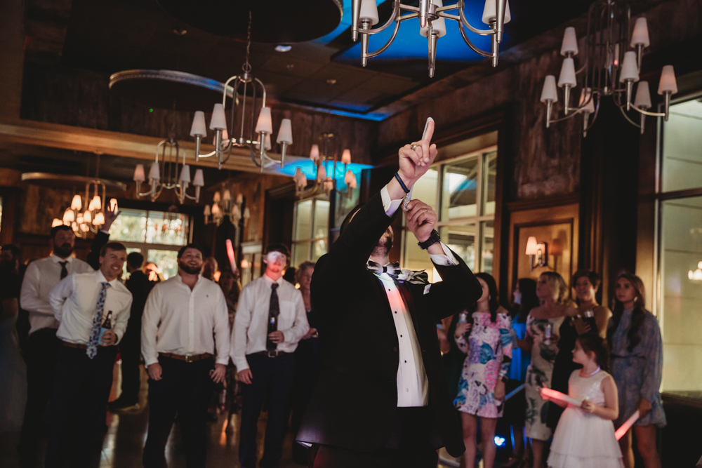 Charleston SC Wedding moment during wedding party celebration, captured by south carolina wedding photographer.