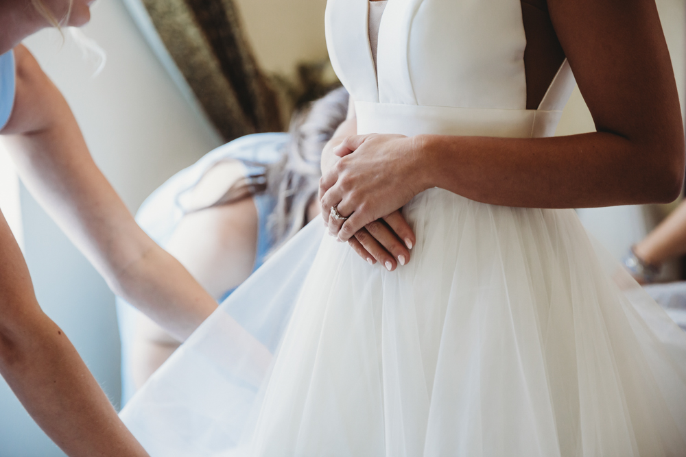 Wedding moment bridal party at The Citadel, captured by charleston sc.