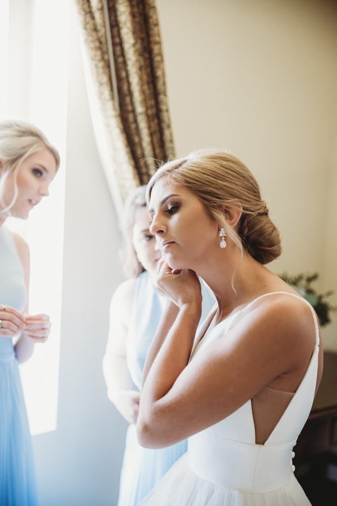Wedding moment bridal party at The Citadel, captured by charleston sc.