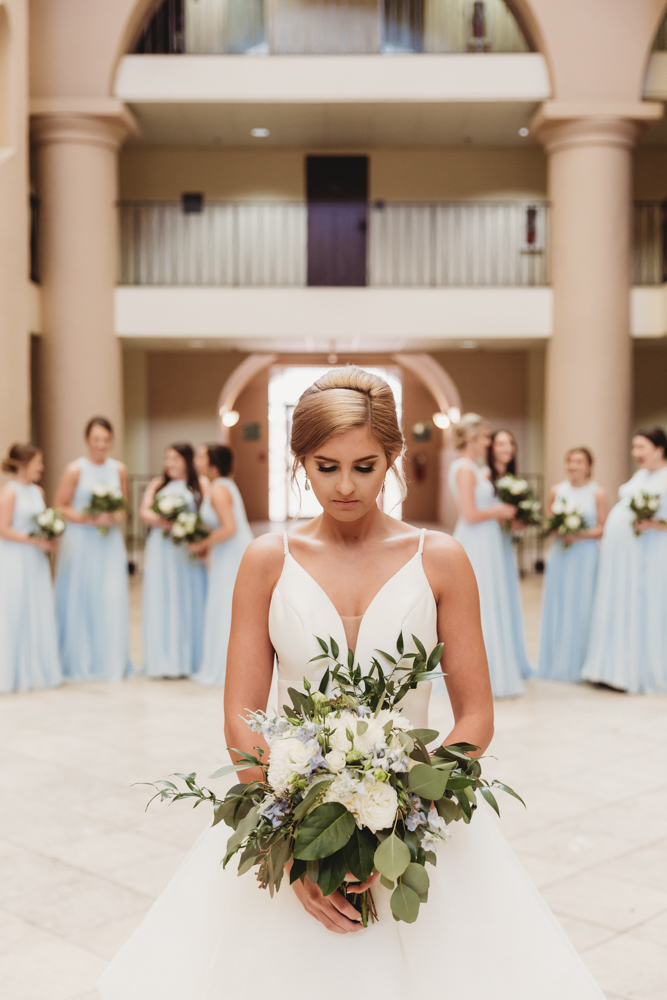 Wedding moment during bridal portraits, captured by tracy rowell.