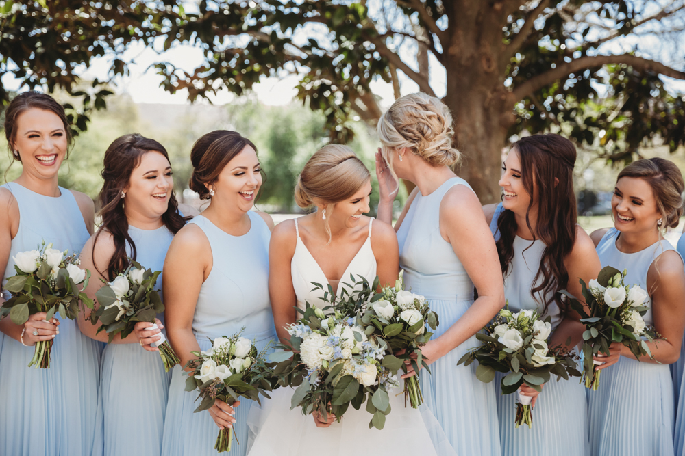 Wedding moment during bridal portraits, captured by tracy rowell.