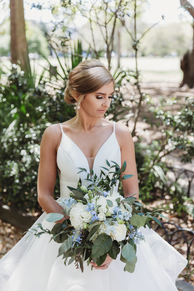 Wedding moment during bridal portraits, captured by tracy rowell.