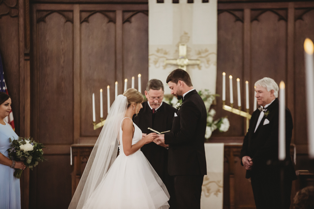 Wedding moment during ceremony at The Citadel, captured by reflection images by tracy rowell.