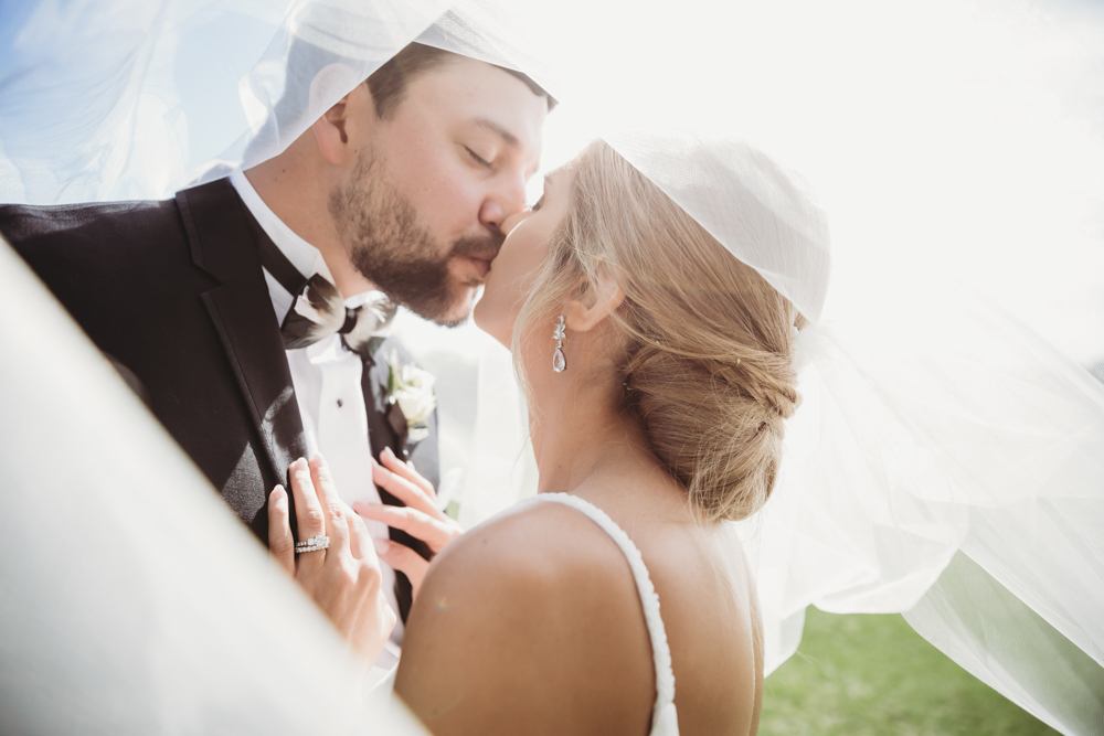 Wedding moment during bride and groom moment, captured by reflection images by tracy rowell.
