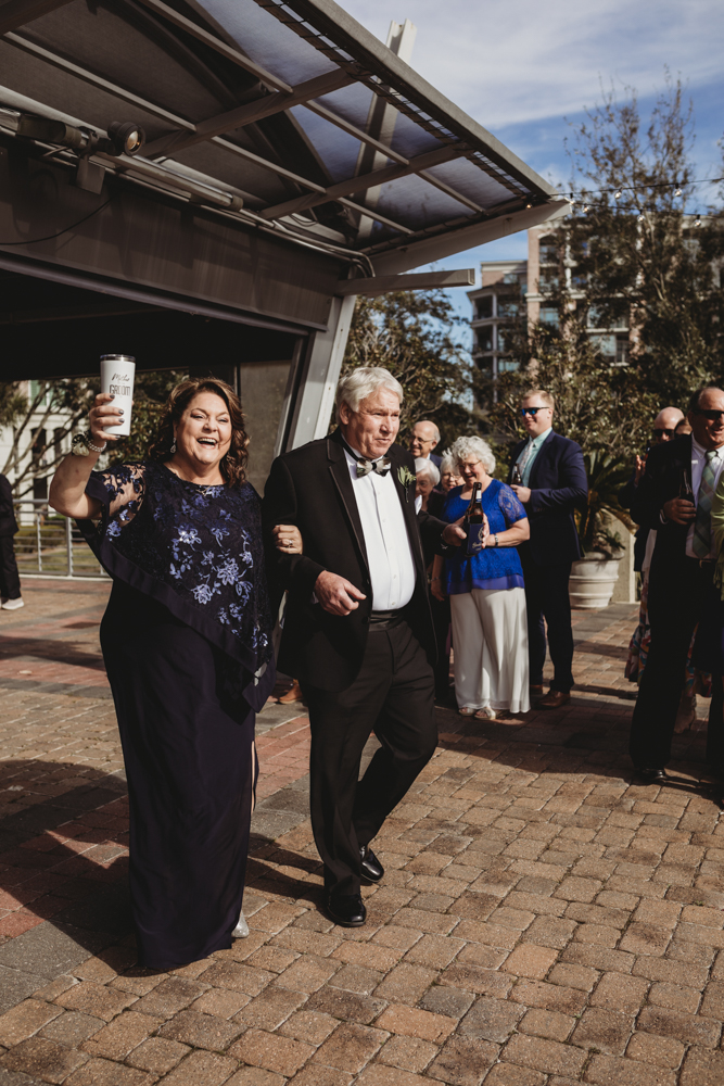 Charleston SC Wedding moment during wedding party celebration, captured by tracy rowell.