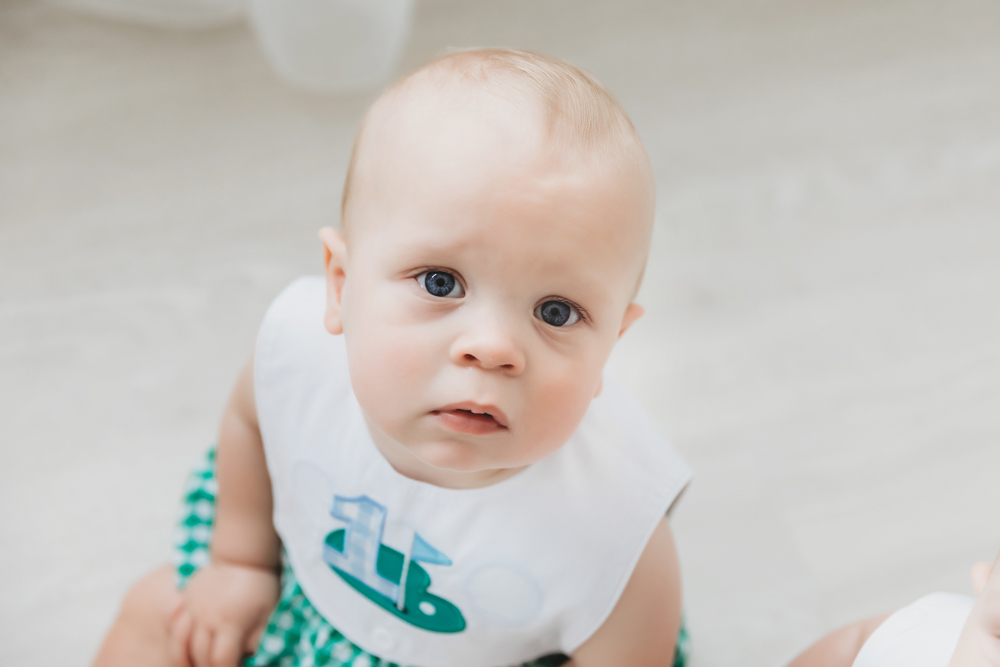 Macro portrait close-up of the other twin's blue eyes and serious expression at Reflection Images by Tracy Rowell in Florence SC