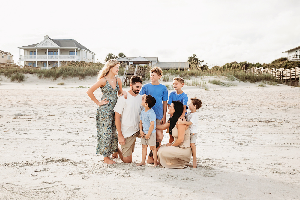 Culpepper family in beige and blue beach attire on Pawleys Island SC, captured by a professional family photographer.